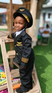 Child dressed in a pilot costume at Brainy Explorers Montessori