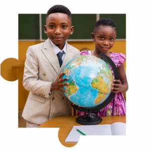 Two Brainy Explorers Montessori pupils holding a globe