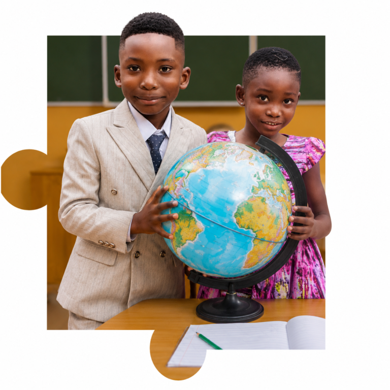 Two Brainy Explorers Montessori pupils holding a globe